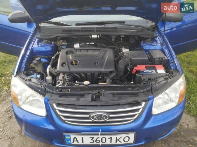 Синий Киа Черато, объемом двигателя 1.6 л и пробегом 297 тыс. км за 3900 $, фото 14 на Automoto.ua