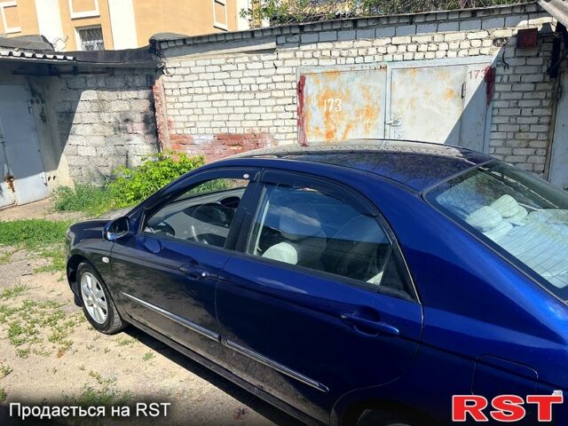 Синій Кіа Черато, об'ємом двигуна 1.6 л та пробігом 170 тис. км за 4400 $, фото 3 на Automoto.ua
