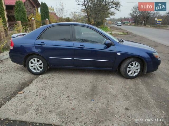 Синий Киа Черато, объемом двигателя 1.98 л и пробегом 246 тыс. км за 4400 $, фото 8 на Automoto.ua