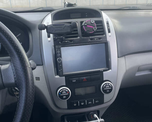 Синий Киа Черато, объемом двигателя 1.59 л и пробегом 297 тыс. км за 3499 $, фото 7 на Automoto.ua