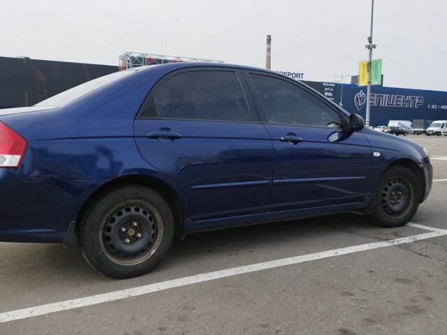Синий Киа Черато, объемом двигателя 2 л и пробегом 253 тыс. км за 4900 $, фото 3 на Automoto.ua