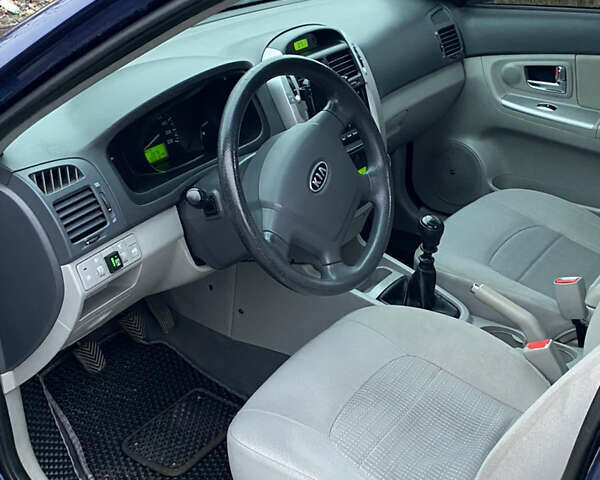 Синій Кіа Черато, об'ємом двигуна 1.59 л та пробігом 303 тис. км за 4400 $, фото 18 на Automoto.ua