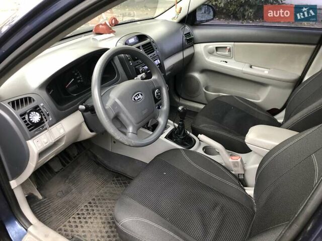 Синий Киа Черато, объемом двигателя 1.6 л и пробегом 292 тыс. км за 4400 $, фото 7 на Automoto.ua