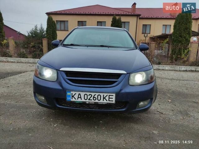 Синий Киа Черато, объемом двигателя 1.98 л и пробегом 246 тыс. км за 4400 $, фото 3 на Automoto.ua