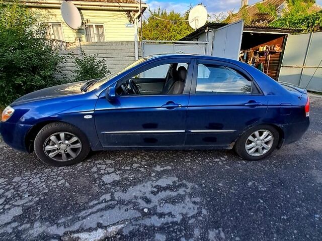 Синий Киа Черато, объемом двигателя 1.6 л и пробегом 269 тыс. км за 3700 $, фото 2 на Automoto.ua