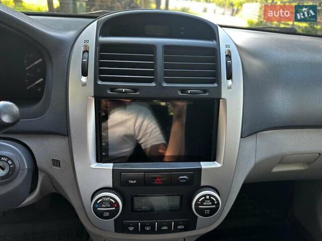 Синій Кіа Черато, об'ємом двигуна 1.6 л та пробігом 248 тис. км за 5990 $, фото 12 на Automoto.ua