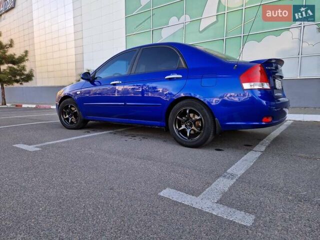 Синий Киа Черато, объемом двигателя 1.59 л и пробегом 223 тыс. км за 5100 $, фото 2 на Automoto.ua