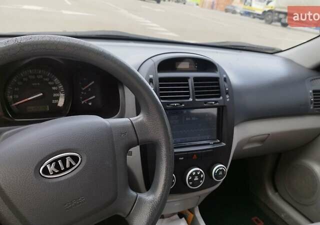 Синий Киа Черато, объемом двигателя 1.59 л и пробегом 253 тыс. км за 4700 $, фото 6 на Automoto.ua