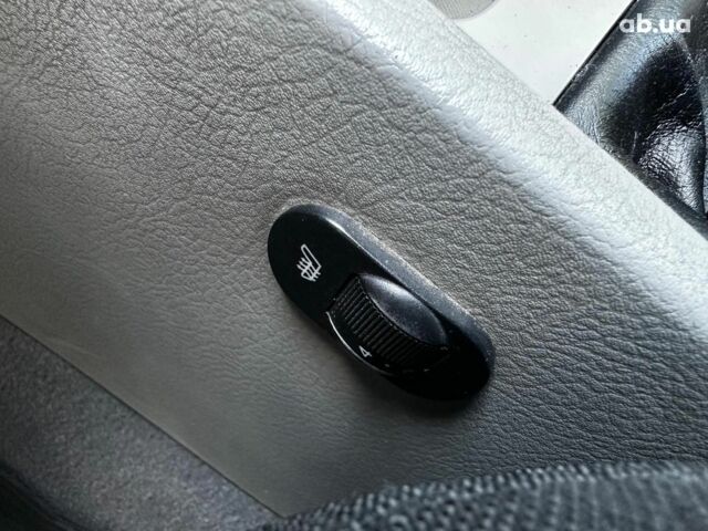 Синий Киа Черато, объемом двигателя 1.6 л и пробегом 248 тыс. км за 5990 $, фото 15 на Automoto.ua