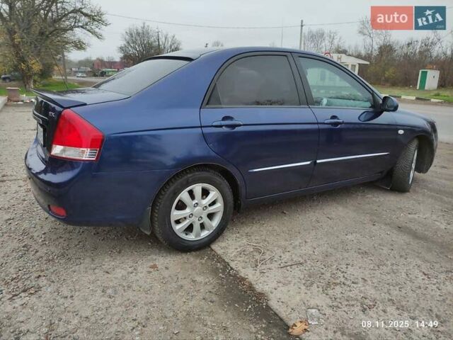 Синий Киа Черато, объемом двигателя 1.98 л и пробегом 246 тыс. км за 4400 $, фото 14 на Automoto.ua