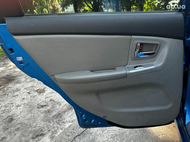 Синий Киа Черато, объемом двигателя 1.6 л и пробегом 248 тыс. км за 5990 $, фото 16 на Automoto.ua