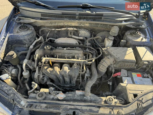 Синий Киа Черато, объемом двигателя 1.59 л и пробегом 250 тыс. км за 3100 $, фото 36 на Automoto.ua