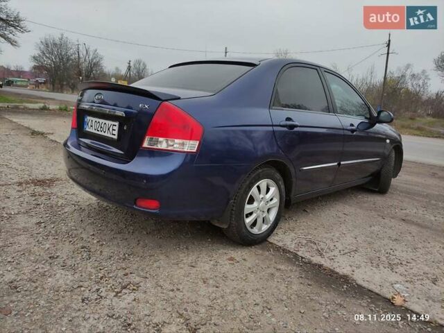 Синий Киа Черато, объемом двигателя 1.98 л и пробегом 246 тыс. км за 4400 $, фото 6 на Automoto.ua