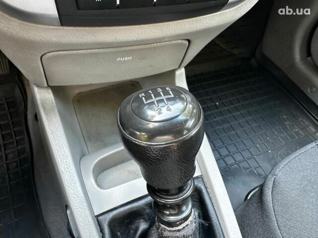 Синий Киа Черато, объемом двигателя 1.6 л и пробегом 248 тыс. км за 5990 $, фото 14 на Automoto.ua