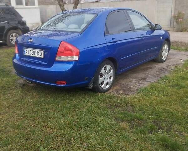 Синий Киа Черато, объемом двигателя 1.6 л и пробегом 297 тыс. км за 3900 $, фото 3 на Automoto.ua
