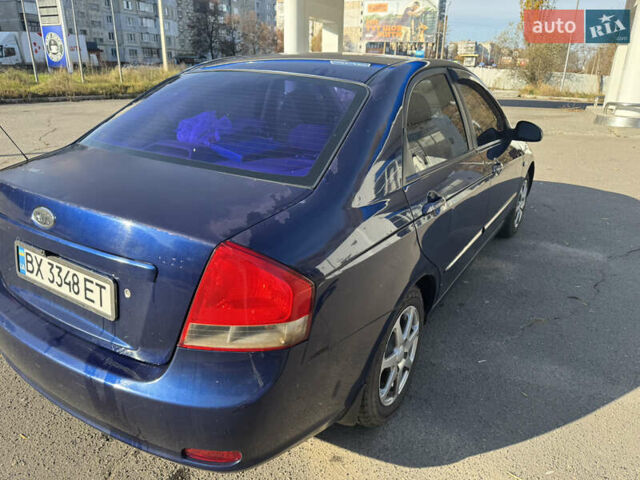Синий Киа Черато, объемом двигателя 1.59 л и пробегом 250 тыс. км за 3100 $, фото 23 на Automoto.ua