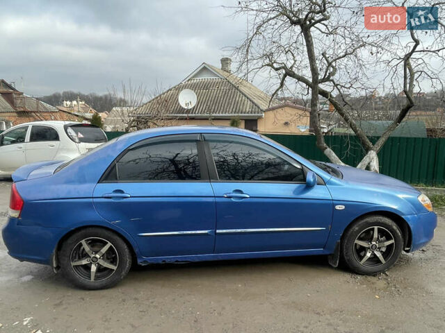 Синій Кіа Черато, об'ємом двигуна 2 л та пробігом 420 тис. км за 2500 $, фото 5 на Automoto.ua