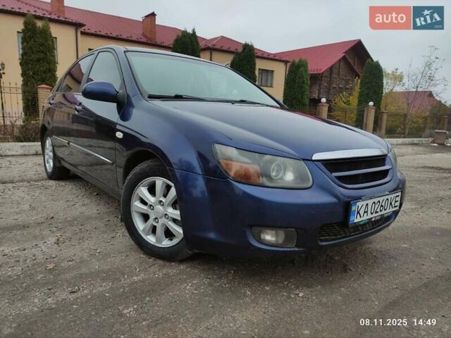 Синий Киа Черато, объемом двигателя 1.98 л и пробегом 246 тыс. км за 4400 $, фото 23 на Automoto.ua