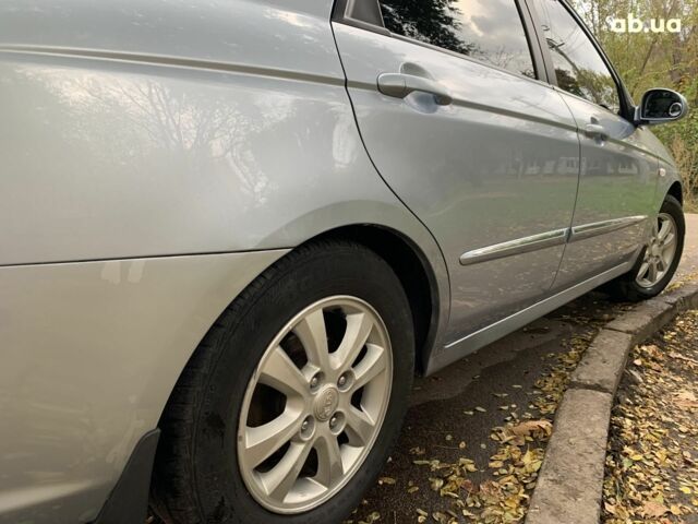 Синій Кіа Черато, об'ємом двигуна 2 л та пробігом 199 тис. км за 5299 $, фото 8 на Automoto.ua