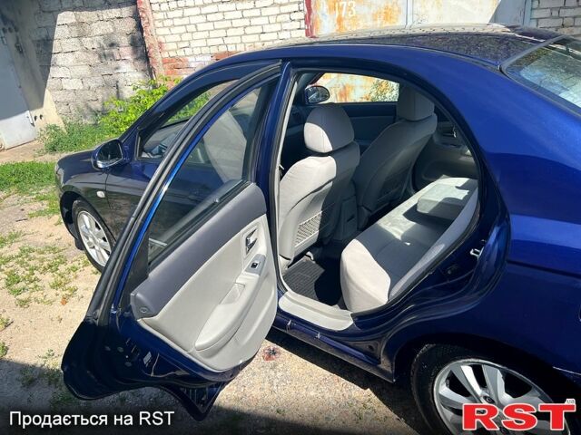 Синій Кіа Черато, об'ємом двигуна 1.6 л та пробігом 170 тис. км за 4400 $, фото 4 на Automoto.ua