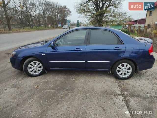 Синий Киа Черато, объемом двигателя 1.98 л и пробегом 246 тыс. км за 4400 $, фото 7 на Automoto.ua