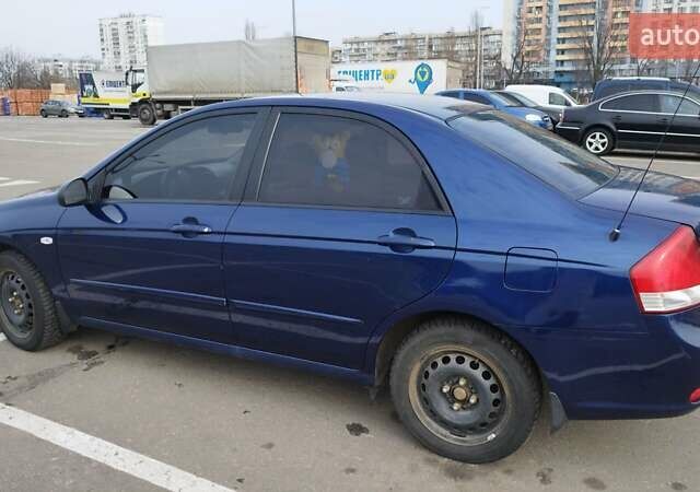 Синий Киа Черато, объемом двигателя 1.59 л и пробегом 253 тыс. км за 4700 $, фото 4 на Automoto.ua