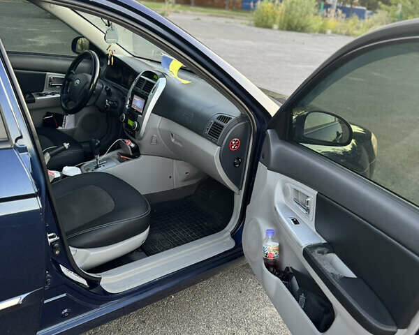Синий Киа Черато, объемом двигателя 2 л и пробегом 258 тыс. км за 5500 $, фото 8 на Automoto.ua