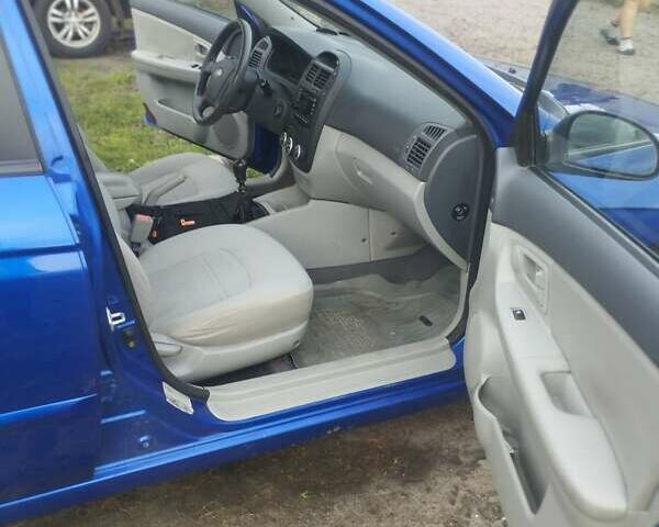 Синий Киа Черато, объемом двигателя 1.6 л и пробегом 297 тыс. км за 3900 $, фото 11 на Automoto.ua