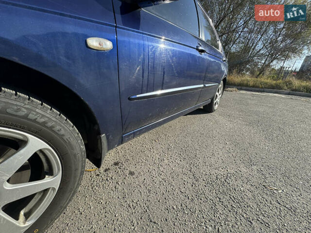 Синий Киа Черато, объемом двигателя 1.59 л и пробегом 250 тыс. км за 3100 $, фото 9 на Automoto.ua
