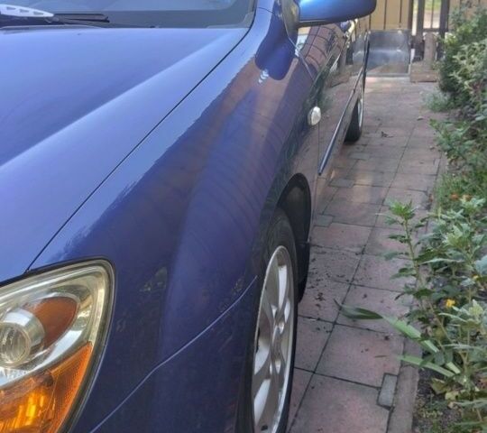 Синий Киа Черато, объемом двигателя 1.6 л и пробегом 163 тыс. км за 4500 $, фото 2 на Automoto.ua