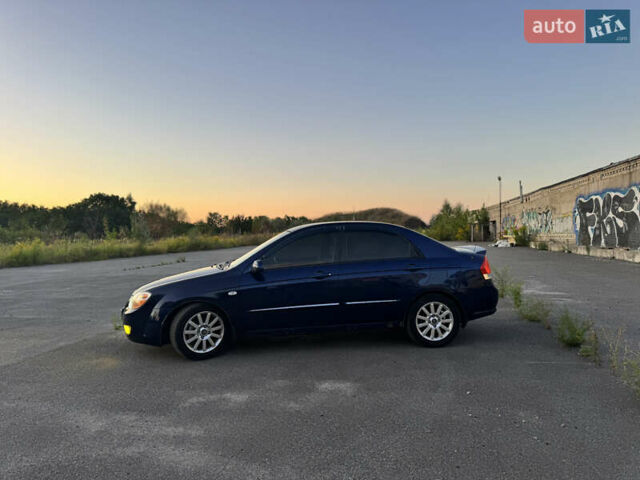 Синий Киа Черато, объемом двигателя 2 л и пробегом 258 тыс. км за 5500 $, фото 5 на Automoto.ua