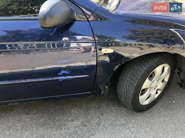 Синий Киа Черато, объемом двигателя 1.6 л и пробегом 292 тыс. км за 4400 $, фото 4 на Automoto.ua