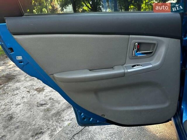 Синій Кіа Черато, об'ємом двигуна 1.6 л та пробігом 248 тис. км за 5990 $, фото 16 на Automoto.ua