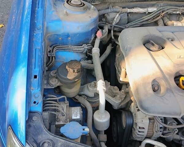 Синий Киа Черато, объемом двигателя 1.6 л и пробегом 227 тыс. км за 4500 $, фото 1 на Automoto.ua