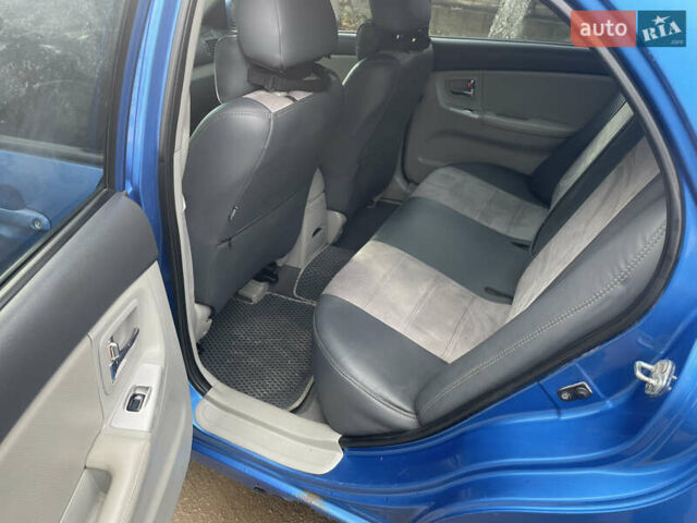 Синій Кіа Черато, об'ємом двигуна 2 л та пробігом 420 тис. км за 2500 $, фото 10 на Automoto.ua