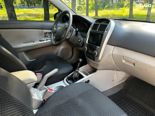 Синий Киа Черато, объемом двигателя 1.6 л и пробегом 248 тыс. км за 5990 $, фото 21 на Automoto.ua