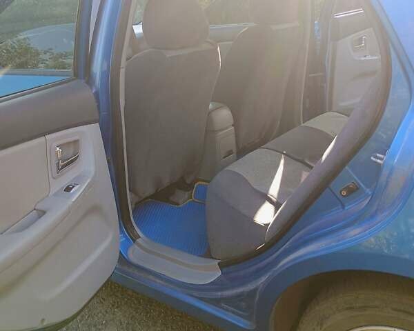 Синий Киа Черато, объемом двигателя 1.6 л и пробегом 227 тыс. км за 4500 $, фото 4 на Automoto.ua