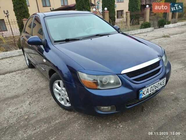 Синий Киа Черато, объемом двигателя 1.98 л и пробегом 246 тыс. км за 4400 $, фото 4 на Automoto.ua