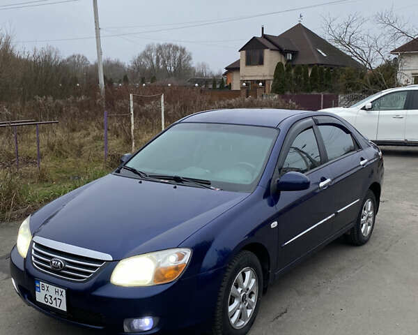 Синій Кіа Черато, об'ємом двигуна 1.59 л та пробігом 303 тис. км за 4400 $, фото 1 на Automoto.ua