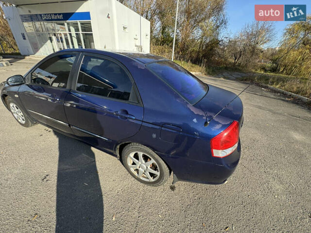 Синий Киа Черато, объемом двигателя 1.59 л и пробегом 250 тыс. км за 3100 $, фото 12 на Automoto.ua