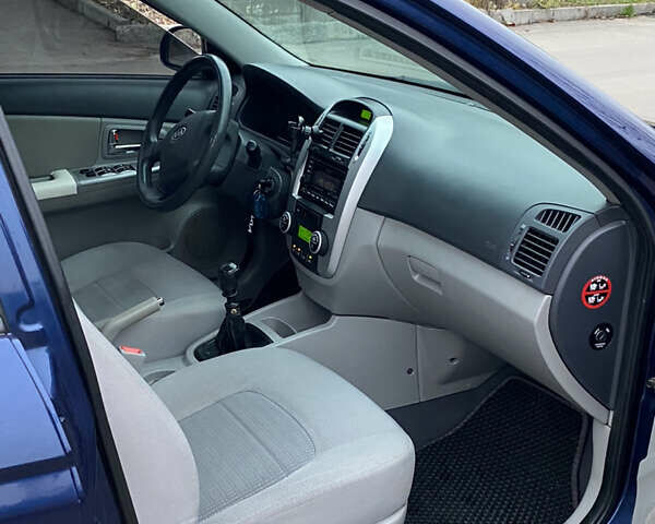 Синій Кіа Черато, об'ємом двигуна 1.59 л та пробігом 303 тис. км за 4400 $, фото 19 на Automoto.ua