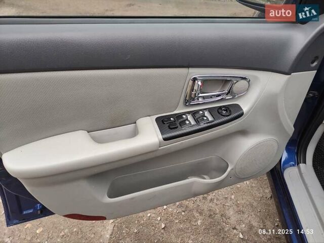 Синий Киа Черато, объемом двигателя 1.98 л и пробегом 246 тыс. км за 4400 $, фото 32 на Automoto.ua