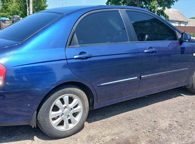 Синий Киа Черато, объемом двигателя 0 л и пробегом 283 тыс. км за 4000 $, фото 2 на Automoto.ua