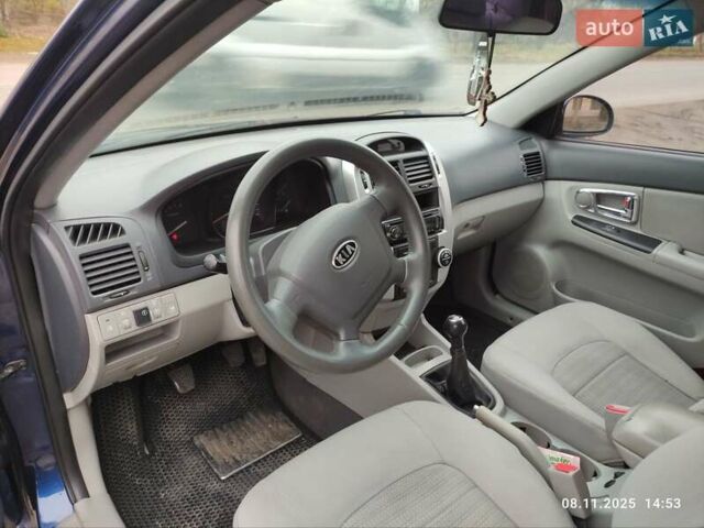 Синий Киа Черато, объемом двигателя 1.98 л и пробегом 246 тыс. км за 4400 $, фото 28 на Automoto.ua