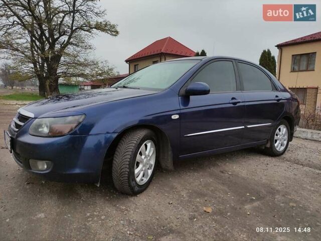 Синий Киа Черато, объемом двигателя 1.98 л и пробегом 246 тыс. км за 4400 $, фото 20 на Automoto.ua