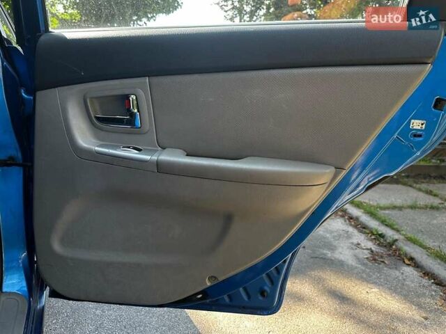 Синій Кіа Черато, об'ємом двигуна 1.6 л та пробігом 248 тис. км за 5990 $, фото 18 на Automoto.ua
