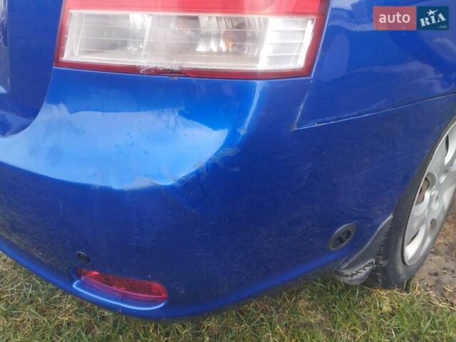 Синий Киа Черато, объемом двигателя 1.6 л и пробегом 297 тыс. км за 3900 $, фото 20 на Automoto.ua