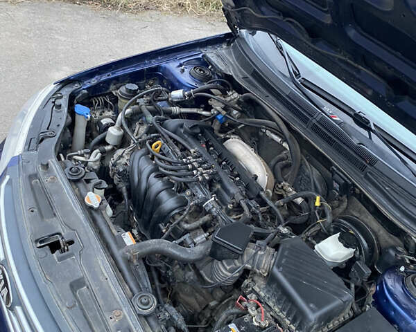 Синій Кіа Черато, об'ємом двигуна 1.59 л та пробігом 303 тис. км за 4400 $, фото 36 на Automoto.ua