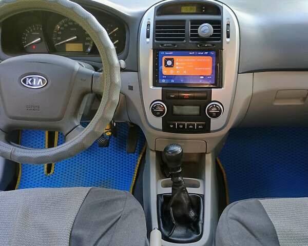 Синий Киа Черато, объемом двигателя 1.6 л и пробегом 227 тыс. км за 4500 $, фото 5 на Automoto.ua