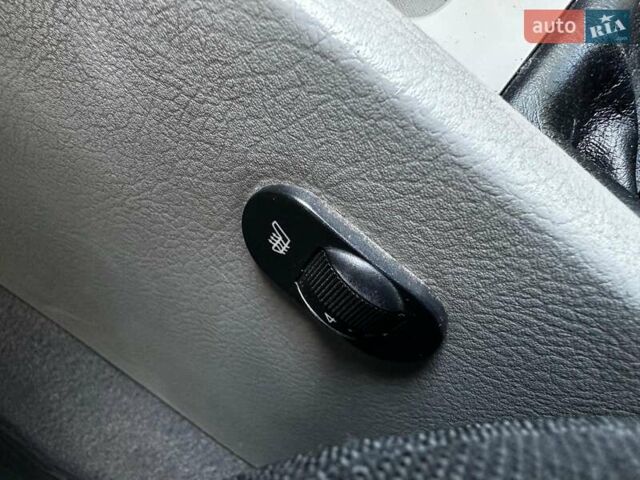 Синій Кіа Черато, об'ємом двигуна 1.6 л та пробігом 248 тис. км за 5990 $, фото 15 на Automoto.ua